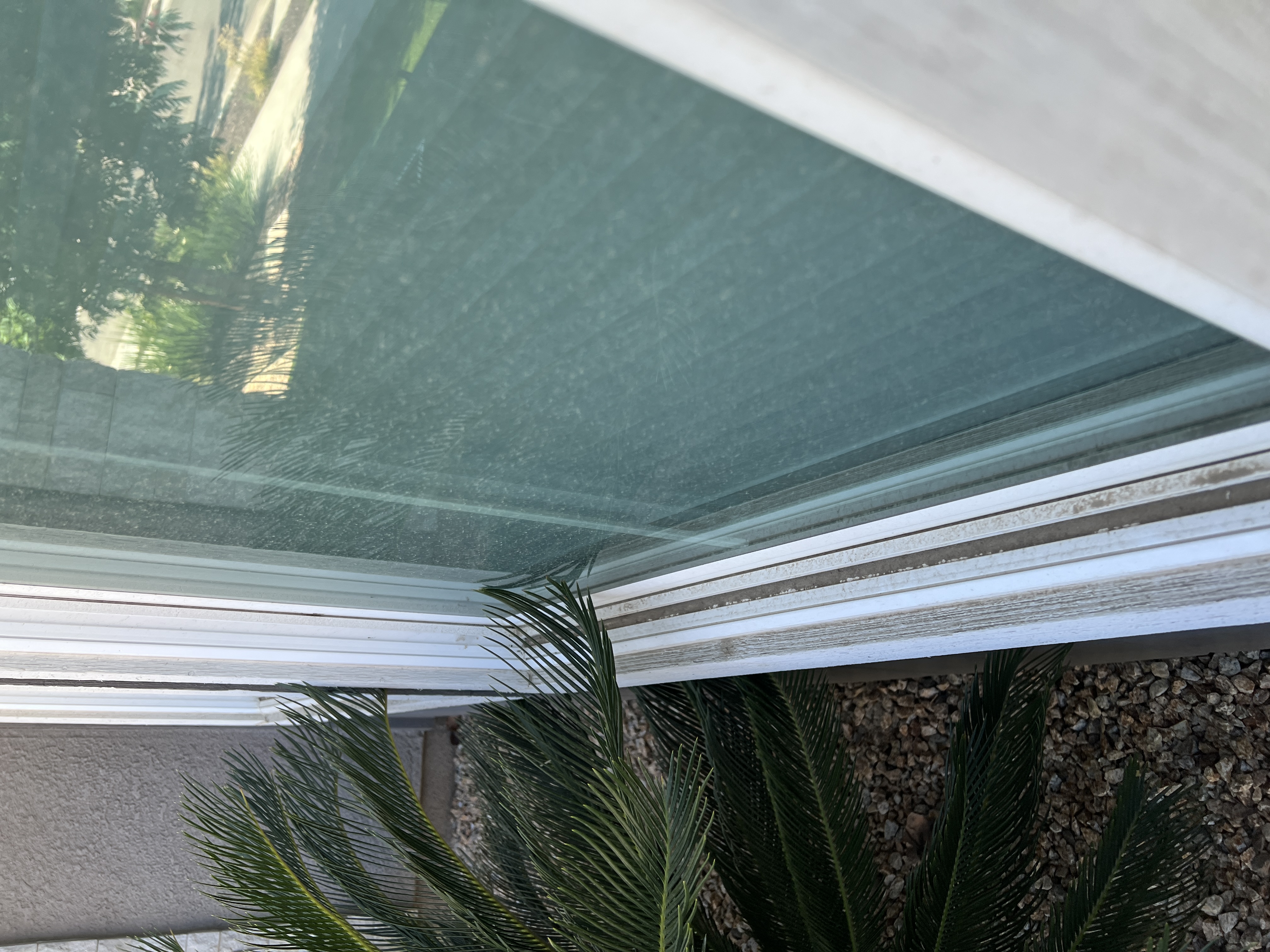 Clean window track after residential window cleaning service Fresno CA